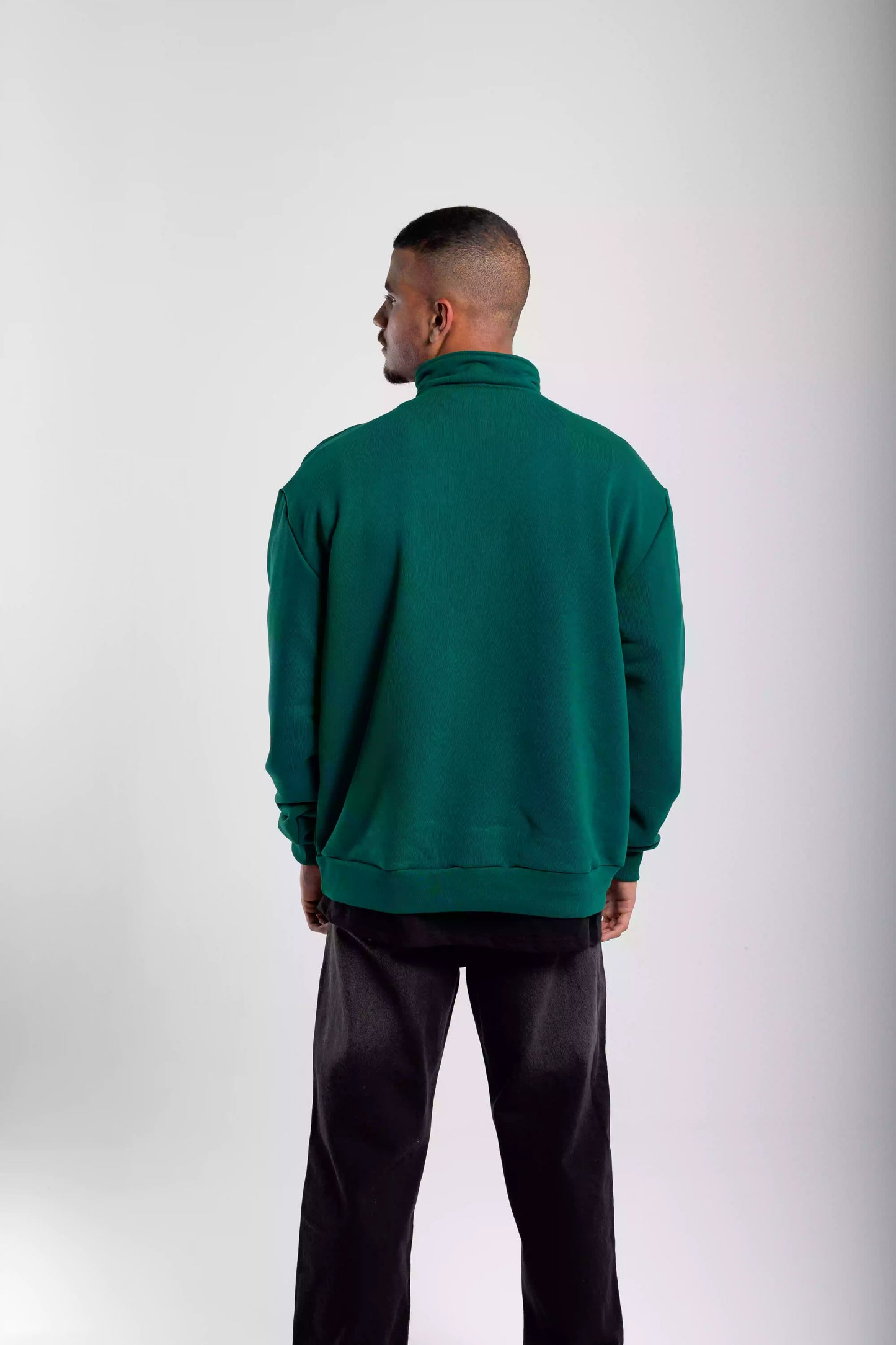 Dark green sweatshirt with quarter zip